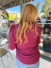 Crimson Ruffle Neck Long Sleeve